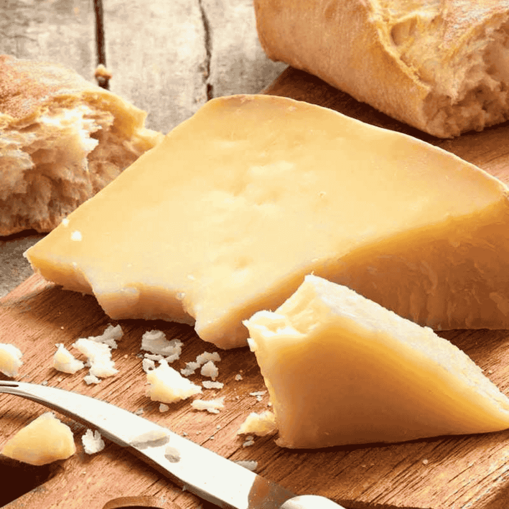 pecorino sardo italian cheese on wood board