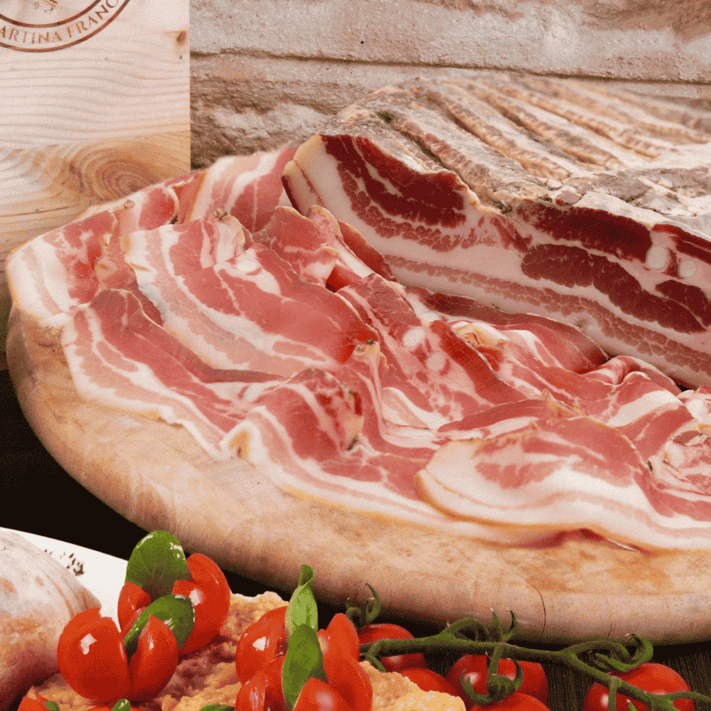 whole pancetta tesa with slices on the side